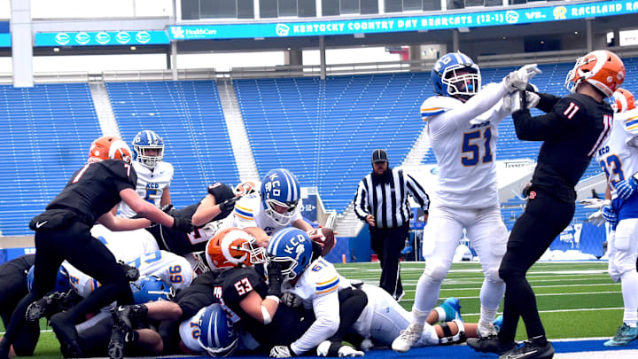 Kentucky Country Day quarterback Caden Long reaches for the touchdown, Friday, Dec. 5, in the 2025 UK Healthcare Sports Medicine State Football 1A Championship at Kroger Field on the campus of the University of Kentucky. The state title was the first for Kentucky Country Day.  