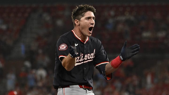 Jul 26, 2024; St. Louis, Missouri, USA; Washington Nationals center fielder Jacob Young (30) reacts after hitting a three-run triple against the St. Louis Cardinals during the tenth inning at Busch Stadium