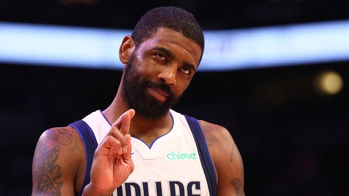 Dec 27, 2024; Phoenix, Arizona, USA; Dallas Mavericks guard Kyrie Irving (11) reacts against the Phoenix Suns at Footprint Center. Mandatory Credit: Mark J. Rebilas-Imagn Images