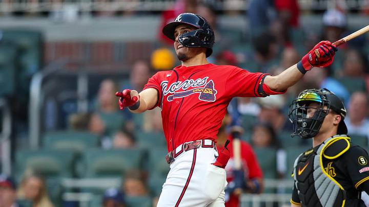 Jun 5, 2026; Atlanta, Georgia, USA; Atlanta Braves shortstop Mauricio Dubon (14) hits a two-run home run against the Pittsburgh Pirates in the third inning at Truist Park. Mandatory Credit: Brett Davis-Imagn Images
