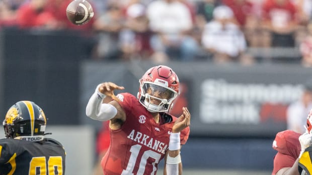 Razorbacks quarterback Taylen Green throws a pass against UAPB