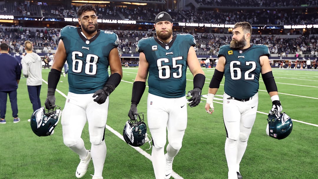 Dec 10, 2023; Arlington, Texas, USA; Philadelphia Eagles offensive tackle Jordan Mailata (68) and offensive tackle Lane Johnson (65) and center Jason Kelce (62) walk off the field after the game against the Dallas Cowboys at AT&T Stadium. Mandatory Credit: Tim Heitman-Imagn Images
