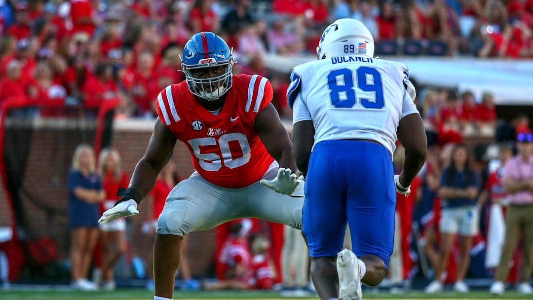 Sep 7, 2024; Oxford, Mississippi, USA; Mississippi Rebels offensive linemen Jayden Williams (50) blocks Middle Tennessee Blue Raiders defensive linemen Brandon Buckner (89) during the second half at Vaught-Hemingway Stadium. Mandatory Credit: Petre Thomas-Imagn Images
