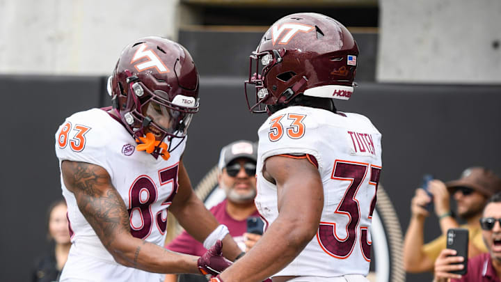 Aug 31, 2024; Nashville, Tennessee, USA;  Virginia Tech Hokies wide receiver Jaylin Lane (83) celebrates the touchdown of running back Bhayshul Tuten (33) gainst the Vanderbilt Commodores during the second half at FirstBank Stadium. Mandatory Credit: Steve Roberts-Imagn Images