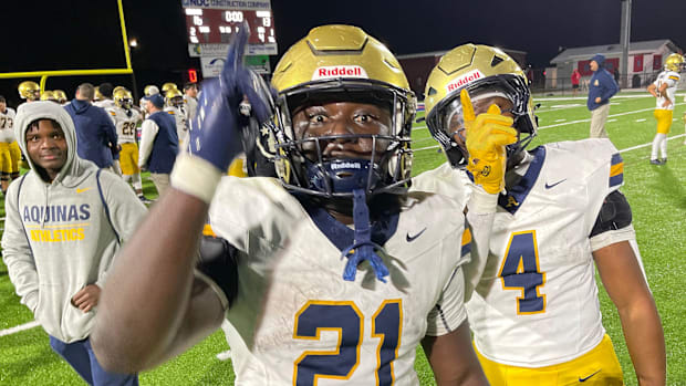 St. Thomas Chance Washington (#21) and Cedric Wyche