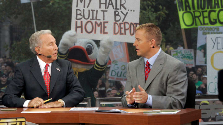 The Duck mascot pokes fun at Lee Corso's and Kirk Herbstreit's hair during taping of ESPN's Game Day in 2010.