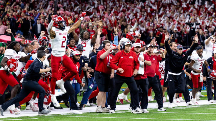 Dec 16, 2023; New Orleans, LA, USA;  Jacksonville State Gamecocks bench reacts to a making a field goal to defeat the Louisiana-Lafayette Ragin Cajuns during overtime at the Caesars Superdome. Mandatory Credit: Stephen Lew-USA TODAY Sports