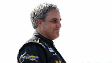 Sep 14, 2024; Watkins Glen, New York, USA; NASCAR Cup Series driver Juan Pablo Montoya stands on pit road during practice and qualifying for the Go Bowling at The Glen at Watkins Glen International. Mandatory Credit: Matthew O'Haren-Imagn Images