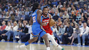 Oct 30, 2025; Oklahoma City, Oklahoma, USA; Washington Wizards guard CJ McCollum (3) drives against Oklahoma City Thunder guard Cason Wallace (22) during the first quarter at Paycom Center.