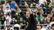 Oregon coach Dan Lanning rallies his team during warmups before the Oregon Spring game at Autzen in Eugene April 26, 2025