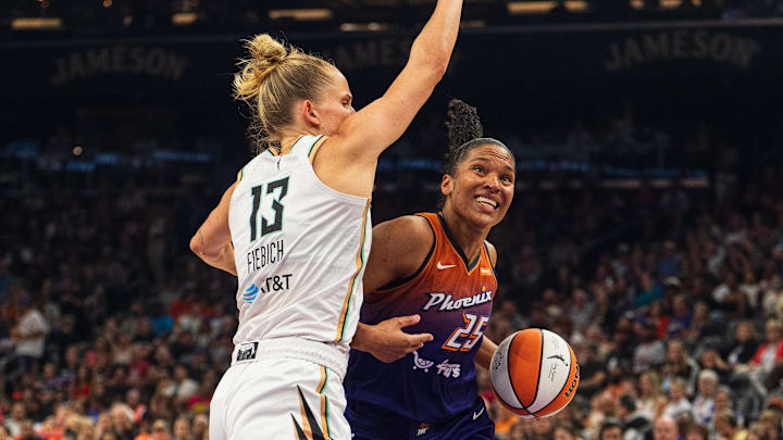 Aug 30, 2025; Phoenix, Arizona, USA; Phoenix Mercury forward Alyssa Thomas (25) drives past New York Liberty forward Leonie Fiebich (13) during the first half of a game at Footprint Center. Mandatory Credit: Allan Henry-Imagn Images Aug 30, 2025; Phoenix, Arizona, USA; Phoenix Mercury forward Alyssa Thomas (25) drives past New York Liberty forward Leonie Fiebich (13) during the first half of a game at Footprint Center. Mandatory Credit: Allan Henry-Imagn Images