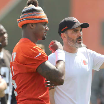 Browns quarterback Deshaun Watson talks with head coach Kevin Stefanski during a workout, Wednesday, June 8, 2022 in Berea.