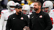 Ohio State Buckeyes offensive coordinator Brian Hartline (right) and head coach Ryan Day