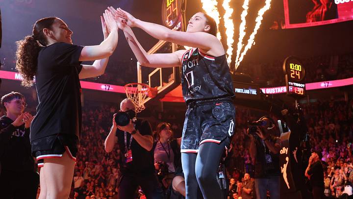 May 30, 2026; Portland, Oregon, USA;  Portland Fire center Megan Gustafson (17) is introduced into the lineup before playing against the Indiana Fever at Moda Center. Mandatory Credit: Jaime Valdez-Imagn Images