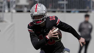 Quarterback Julian Sayin