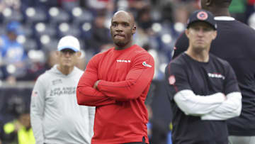 Jan 11, 2025; Houston, Texas, USA; Houston Texans head coach DeMeco Ryans and offensive coordinator Bobby Slowik look on from the field before the game against the Los Angeles Chargers in an AFC wild card game at NRG Stadium. Mandatory Credit: Troy Taormina-Imagn Images