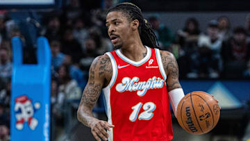 Feb 20, 2025; Indianapolis, Indiana, USA; Memphis Grizzlies guard Ja Morant (12) dribbles the ball  in the first half against the Indiana Pacers at Gainbridge Fieldhouse. Mandatory Credit: Trevor Ruszkowski-Imagn Images