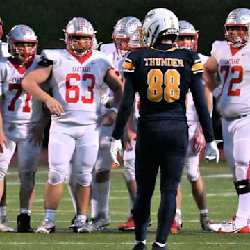The Carthage varsity football team, pictured here competing against Central Valley Academy in 2024, has reclassified from Class B to A for the 2025 season.