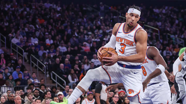 Dec 25, 2024; New York, New York, USA; New York Knicks guard Josh Hart (3) grabs a rebound in the first quarter against the San Antonio Spurs at Madison Square Garden. Mandatory Credit: Wendell Cruz-Imagn Images
