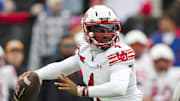 Utah Utes quarterback Devon Dampier (4) throws a pass during the first half against the Kansas Jayhawks at David Booth Kansas Memorial Stadium.