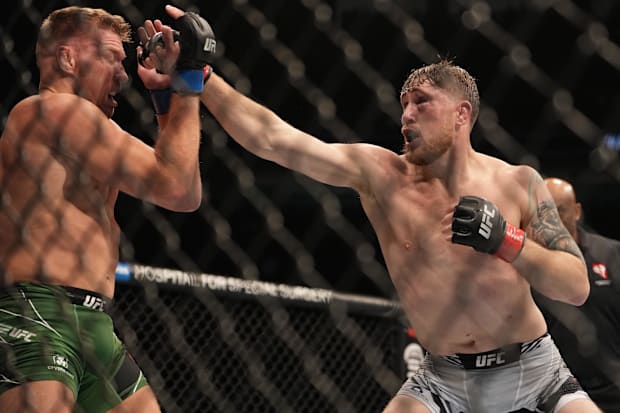Darren Till fights Dricus Du Plessis during UFC 282 at T-Mobile Arena. 