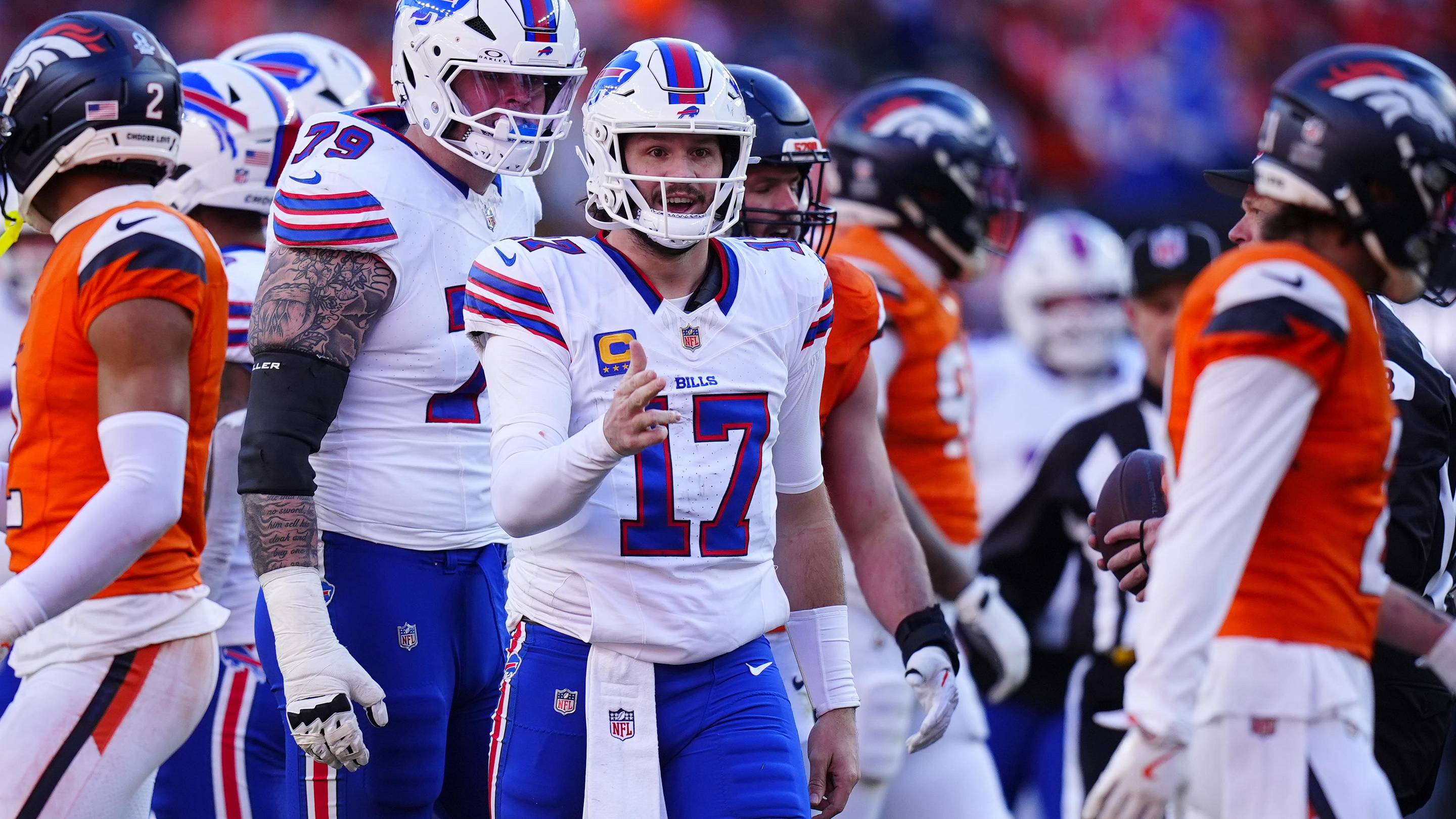Jan 17, 2026; Denver, CO, USA; Buffalo Bills quarterback Josh Allen (17) reacts after a play during the second quarter of an AFC Divisional Round playoff game against the Denver Broncos at Empower Field at Mile High.