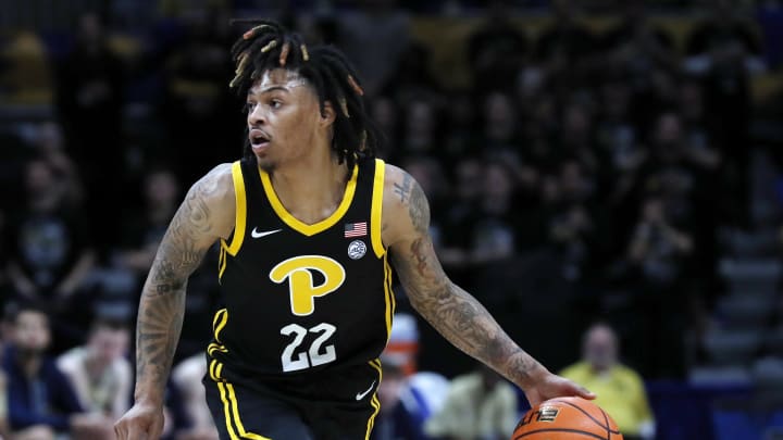 Feb 21, 2023; Pittsburgh, Pennsylvania, USA;  Pittsburgh Panthers guard Nike Sibande (22) dribbles the ball against the Georgia Tech Yellow Jackets during the second half at the Petersen Events Center. Pittsburgh won 76-68. Mandatory Credit: Charles LeClaire-USA TODAY Sports