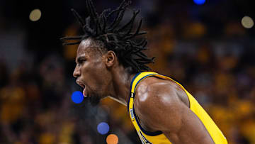 May 17, 2024; Indianapolis, Indiana, USA; Indiana Pacers forward Aaron Nesmith (23) celebrates a made basket  during game six of the second round for the 2024 NBA playoffs against the New York Knicks at Gainbridge Fieldhouse. Mandatory Credit: Trevor Ruszkowski-Imagn Images