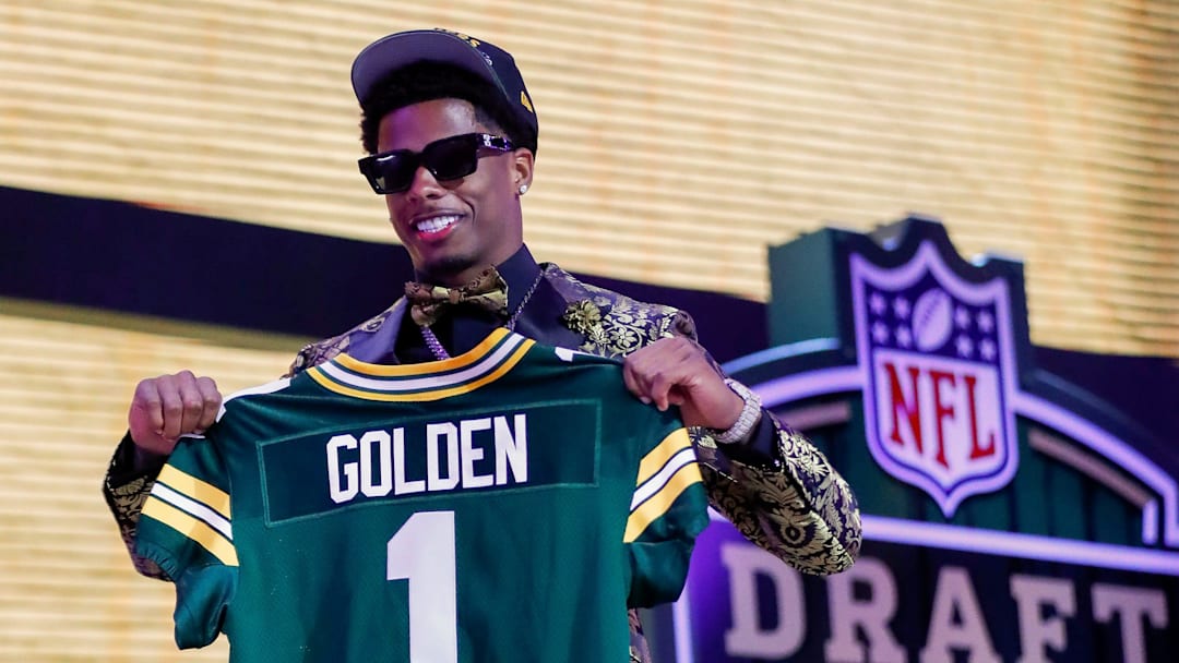 Wide receiver Matthew Golden holds a Green Bay Packers jersey after being selected with the 23rd pick during the first round of the 2025 NFL Draft on Thursday, April 24, 2025, at Lambeau Field in Green Bay, Wisconsin. The draft runs through April 26.
