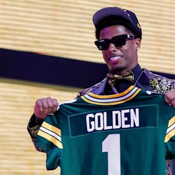 Wide receiver Matthew Golden holds a Green Bay Packers jersey after being selected with the 23rd pick of the 2025 NFL Draft.