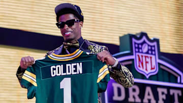 Wide receiver Matthew Golden holds a Green Bay Packers jersey after being selected during the 1st round of the 2025 NFL Draft