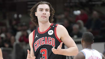 Apr 9, 2025; Chicago, Illinois, USA; Chicago Bulls guard Josh Giddey (3) reacts after making a three point basket against the Miami Heat during the second half at United Center. Mandatory Credit: David Banks-Imagn Images
