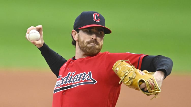 Cleveland Guardians starting pitcher Shane Bieber (57) delivers a pitch