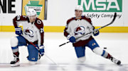 Oct 26, 2023; Pittsburgh, Pennsylvania, USA; Colorado Avalanche left wing Miles Wood (28) and center Ross Colton (20) stretch on the ice before the game against the Pittsburgh Penguins at PPG Paints Arena. Mandatory Credit: Charles LeClaire-Imagn Images