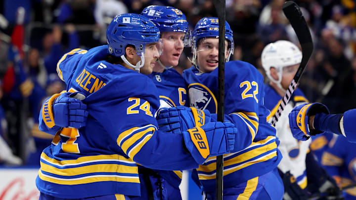 Nov 14, 2024; Buffalo, New York, USA;  Buffalo Sabres defenseman Rasmus Dahlin (26) celebrates his overtime goal with teammates during the third period against the St. Louis Blues at KeyBank Center. Mandatory Credit: Timothy T. Ludwig-Imagn Images