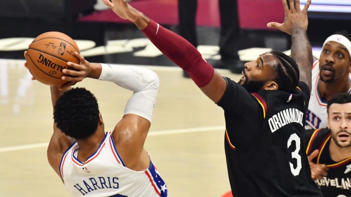 Dec 27, 2020; Cleveland, Ohio, USA; Cleveland Cavaliers center Andre Drummond (3) defends Philadelphia 76ers forward Tobias Harris (12) during the first quarter at Rocket Mortgage FieldHouse. Mandatory Credit: Ken Blaze-USA TODAY Sports