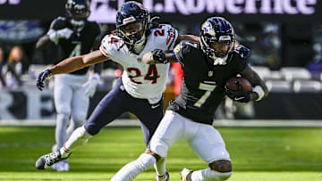 Oct 26, 2025; Baltimore, Maryland, USA;  Baltimore Ravens wide receiver Rashod Bateman (7) runs after the catch as Chicago Bears cornerback Nick McCloud (24) defends  during the game at M&T Bank Stadium. Mandatory Credit: Tommy Gilligan-Imagn Images