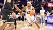 Feb 22, 2023; Baton Rouge, Louisiana, USA; LSU Tigers guard Adam Miller (44) dribbles against the Vanderbilt Commodores during the first half at Pete Maravich Assembly Center. Mandatory Credit: Stephen Lew-Imagn Images