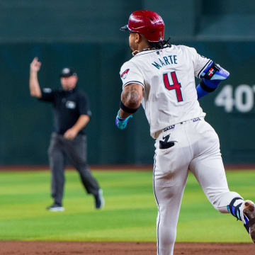 Aug 10, 2024; Phoenix, Arizona, USA; Arizona Diamondbacks infielder Ketel Marte (4) reacts after hitting a home run in the first inning against the Philadelphia Phillies at Chase Field. Mandatory Credit: Allan Henry-USA TODAY Sports