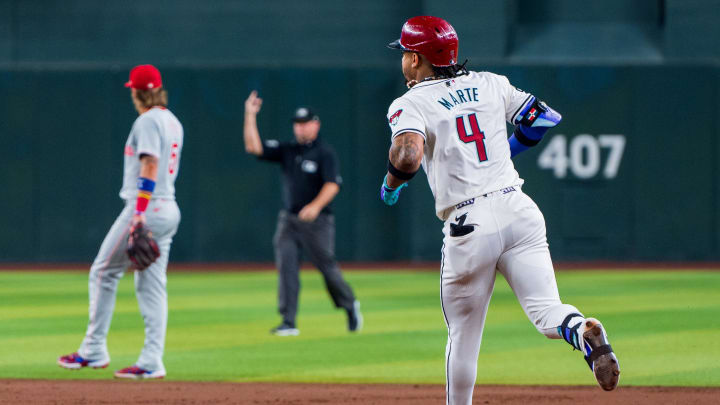 Aug 10, 2024; Phoenix, Arizona, USA; Arizona Diamondbacks infielder Ketel Marte (4) reacts after hitting a home run in the first inning against the Philadelphia Phillies at Chase Field. Mandatory Credit: Allan Henry-USA TODAY Sports