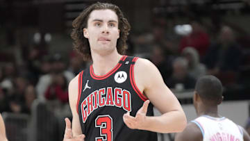 Apr 9, 2025; Chicago, Illinois, USA; Chicago Bulls guard Josh Giddey (3) reacts after making a three point basket against the Miami Heat during the second half at United Center. Mandatory Credit: David Banks-Imagn Images