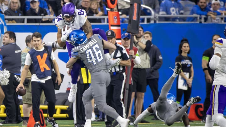 Jan 7, 2024; Detroit, Michigan, USA; Detroit Lions linebacker Jack Campbell (46) tackles Minnesota Vikings tight end Josh Oliver (84). Mandatory Credit: David Reginek-USA TODAY Sports