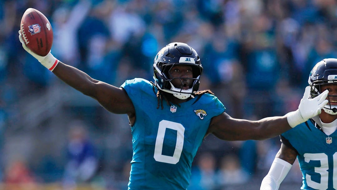 Jacksonville Jaguars linebacker Devin Lloyd (0) reacts to a fumble recovery next to cornerback Montaric Brown (30) during the second quarter of an NFL football AFC Wild Card playoff matchup, Sunday, Jan. 11, 2026, in Jacksonville, Fla. The Bills defeated the Jaguars 27-24. [Corey Perrine/Florida Times-Union]