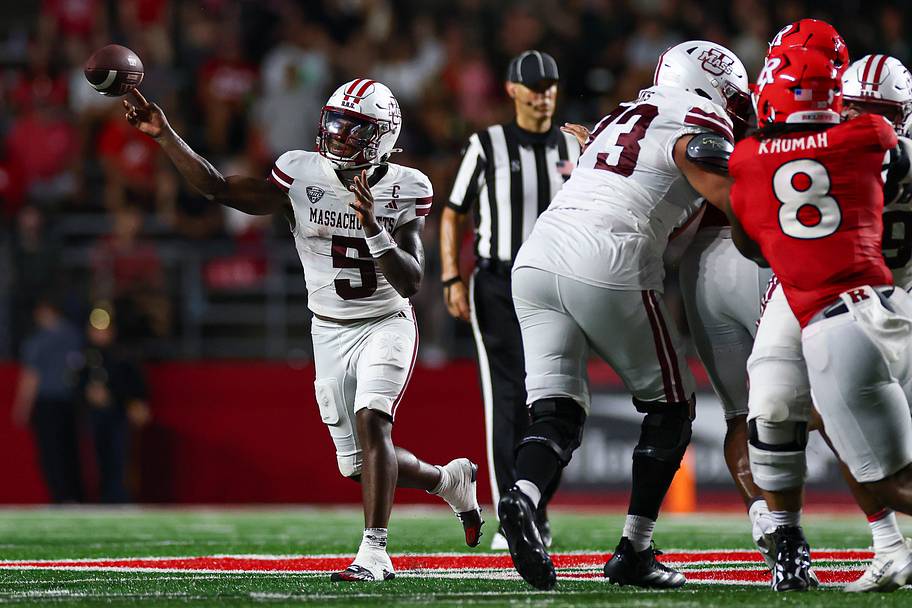 UMass quarterback William Watson III throws a pass against Rutgers.