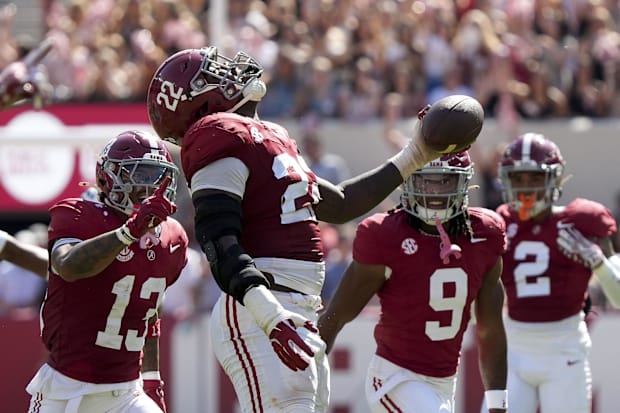 Alabama Crimson Tide defensive lineman LT Overton celebrates after recovering a South Carolina fumble at Bryant-Denny Stadium