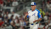 Aug 23, 2025; Cumberland, Georgia, USA; Atlanta Braves manager Brian Snitker (43) walks to the mound to change pitchers against the New York Mets during the seventh inning at Truist Park. Mandatory Credit: Dale Zanine-Imagn Images