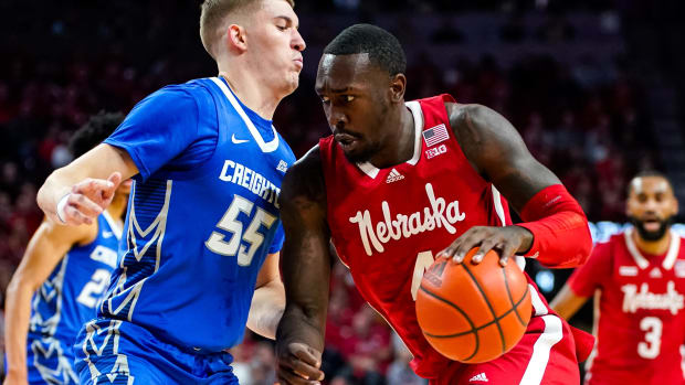 Nebraska Cornhuskers forward Juwan Gary drives against Creighton Bluejays guard Baylor Scheierman.