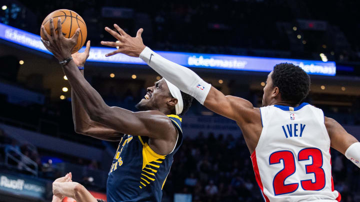 Feb 22, 2024; Indianapolis, Indiana, USA; Indiana Pacers forward Pascal Siakam (43) shoots the ball while Detroit Pistons guard Jaden Ivey (23) defends in the second half at Gainbridge Fieldhouse. Mandatory Credit: Trevor Ruszkowski-USA TODAY Sports