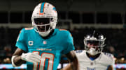 Dec 11, 2023; Miami Gardens, Florida, USA; Miami Dolphins wide receiver Tyreek Hill (10) runs out of bound against the Tennessee Titans during the fourth quarter at Hard Rock Stadium. Mandatory Credit: Sam Navarro-USA TODAY Sports