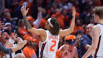 Dec 10, 2024; Champaign, Illinois, USA;  Illinois Fighting Illini guard Dra Gibbs-Lawhorn (2) gestures towards the fans after scoring during the second half against the Wisconsin Badgers  at State Farm Center. Mandatory Credit: Ron Johnson-Imagn Images